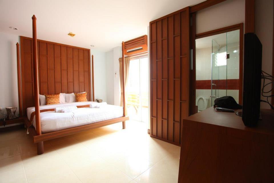 Lotus Hotel Patong Quarto foto